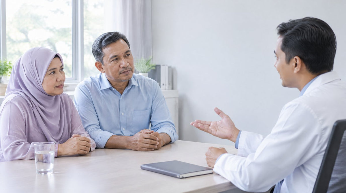 A middle-aged couple talking with a doctor in a bright clinic