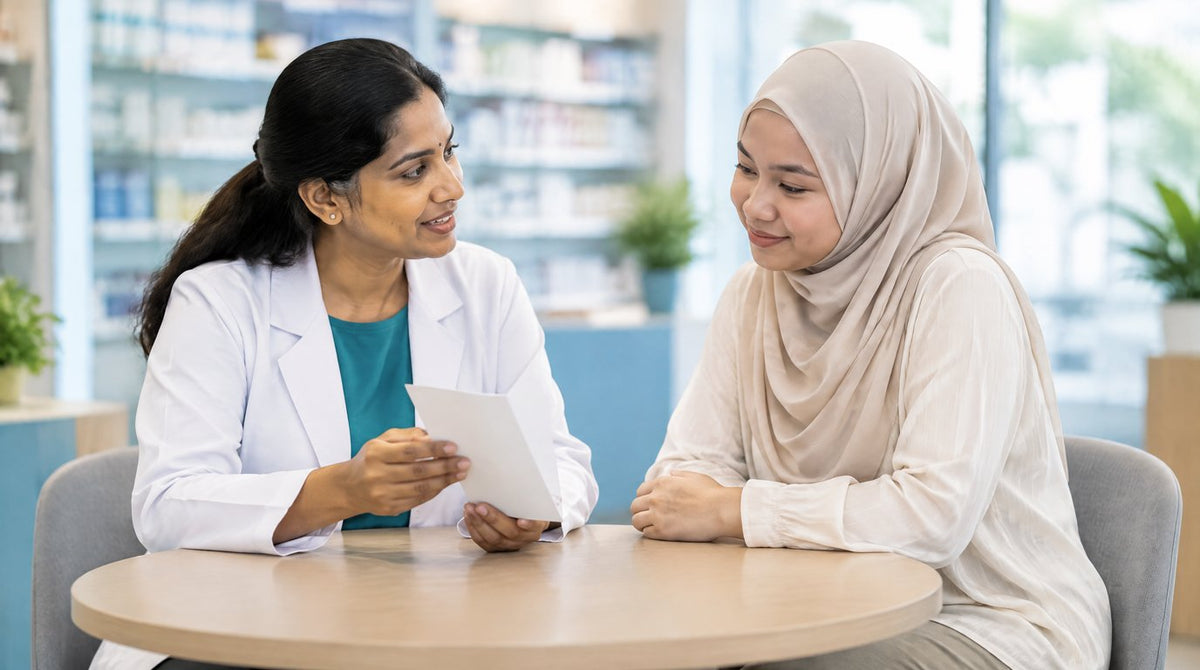 A pharmacist talking privately with a young woman in a pharmacy